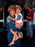 Commander Eileen Collins and Daughter, Bridget Youngs, after Space Shuttle Mission 95, Jul 28, 1999 Photographic Print