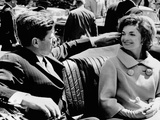 President Kennedy Tidies His Wife's Hair Photographic Print