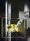 A Nuclear Engineer Is Protected from Radiation by a Fifty-Two Inch Thick Oil-Filled, Glass Window Photographic Print