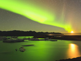 Aurora Borealis and Moon over Icebergs, Jokulsarlon and Breidamerkurjokull, Iceland Photographic Print by Tom Norring