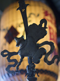 Metal Icon in a Buddhist Temple in Hoi An, Vietnam Photographic Print by David H. Wells