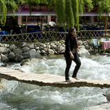 Crossing over Raging River on Precarious Wooden Slatted Bridge, Setti Fatma, Ourika Valley, Morocco Photographic Print by Ellen Rooney