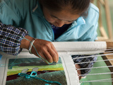 Woman Silk Embroidering at Naxi Hand-Made Embroidery Institute, Baisha Village, Lijiang, China Photographic Print by Lynn Gail
