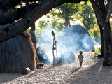 Sunlight Streaming Through Smoke, Jul'Hoan !Kung Bushman Village, Bushmanland, Namibia Photographic Print by Kim Walker