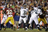 NFL Playoffs 2013: Seahawks vs Redskins - Russell Wilson Photographic Print by Evan Vucci