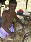 Market Stall Holder Selling Dried Fish, Nilaveli, Trincomalee, Sri Lanka, Asia Photographic Print by Peter Barritt