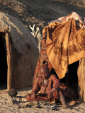 Himba Woman Sitting Outside Her Hut, Purros Village, Northern Kaokoland, Namibia, Africa Photographic Print by Kim Walker