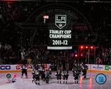The Los Angeles Kings watch as their 2011-12 Championship Banner is raised Photo