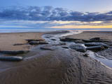 Sunset over Rocks with Flowing Water at Dunraven Bay, Southerndown, Wales Photographic Print by Chris Hepburn
