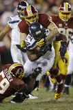 NFL Playoffs 2013: Seahawks vs Redskins - Marshawn Lynch Photographic Print by Matt Slocum