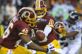 NFL Playoffs 2013: Seahawks vs Redskins - Robert Griffin III and Alfred Morris Photographic Print by Richard Lipski