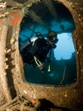 Diver Inside Wreck of Lesleen M Freighter, Sunk in 1985 in Anse Cochon Bay, St Lucia Photographic Print by Lisa Collins