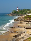 View to the Lighthouse with Fishermen, Kovalam, Kerala, India, Asia Photographic Print by Stuart Black