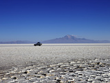 A 4x4 on Salar de Uyuni, the Largest Salt Flat in the World, South West Bolivia, Bolivia Photographic Print by Simon Montgomery