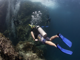 Divers Going into the Chimney at Sail Rock, Koh Tao, Thailand, Southeast Asia, Asia Photographic Print by Lisa Collins