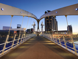 Dawn View across the Millennium Bridge, Salford Quays, Manchester, Greater Manchester, England, UK Photographic Print by Chris Hepburn