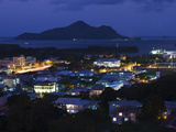 Cityscape Lit Up at Dusk Viewed from Beau Vallon Road, Victoria, Mahe Island, Seychelles Photographic Print by  Green Light Collection