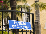 Beware of Children Sign on a Gate, Notre Dame Des Anges Church, Mahebourg, Mauritius Photographie par  Green Light Collection