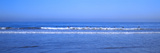 Surfers Riding a Wave in the Sea, Santa Monica, Los Angeles County, California, USA Photographic Print by Panoramic Images 
