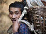 A Porter Carries a Doko, a Back Basket, Using a Namlo, or Head Strap Photographic Print by Alex Treadway