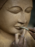 A Man Sculps a Buddha from Clay Which Will Eventually Be Bronzed Photographic Print by Alex Treadway