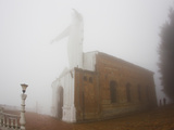 Thick Fog Engulfing the Santuario De Guadalupe Christ Statue Photographic Print by Mike Theiss