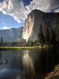El Capitan Rises Above the Merced River Photographic Print by Raul Touzon