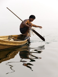 A Man Pulls in His Net on Indawgyi Lake, Northern Myanmar Photographic Print by Alex Treadway