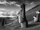 A Path Winds Past Moai Spread across Rolling Hills Photographic Print by Jim Richardson