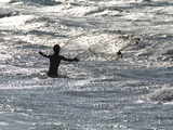A Fisherman Casts a Net on the North Coast of Socotra Photographic Print by Michael Melford
