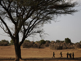 Kara Children Playing Games in their Village Photographic Print by Randy Olson