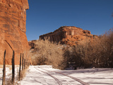 Tire Tracks in the Snow at the Canyon De Chelly Cliffs Photographic Print by James Forte