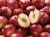 Many Nectarines, One Halved Lámina fotográfica