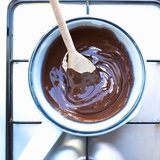 Pan of Melted Chocolate on a Cooker Photographic Print by Dave King