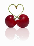 Pair of Cherries Forming a Heart Photographic Print by  Kröger & Gross
