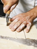 Cutting Pasta Dough into Strips with Pastry Wheel Fotografisk tryk