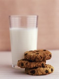 Chocolate Chip Oat Biscuits and a Glass of Milk Photographic Print by Jignesh Jhaveri