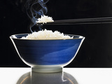 A Bowl of Steaming Rice Photographic Print by Peter Rees
