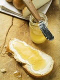 Slice of Bread Plait with Butter and Honey Photographie