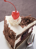 Piece of Black Forest Gateau with Cherry Photographic Print