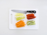Julienne Vegetables on a Chopping Board with a Knife Photographic Print by Anthony Lanneretonne