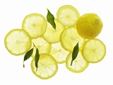 A Whole Lemon, Lemon Slices and Leaves Photographic Print by Petr Gross