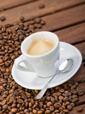 Cup of Espresso and Coffee Beans Fotografie-Druck von Chris Schäfer