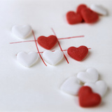 Several White and Red Grape Sugar Hearts Photographic Print by Anita Brantley