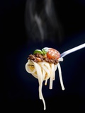 Linguine with a Minced Meat Sauce, Tomatoes and Basil on a Fork Photographic Print by Mark Vogel