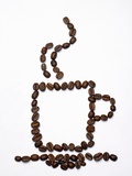 Outline of a Cup of Coffee in Coffee Beans Photographic Print by Gustavo Andrade