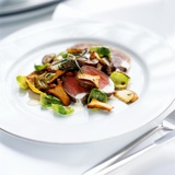 Venison Fillet with Sprout Leaves and Chanterelle Mushrooms Photographic Print by Stefan Braun