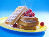 Waffles with Raspberries and Icing Sugar Photographic Print