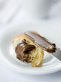 Chocolate Spread on a Croissant with a Knife Photographic Print by Ira Leoni