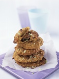 Chocolate Chip Cookies, Stacked on Paper Photographic Print by Ian Garlick